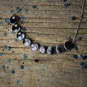 Curved Moon Phase Necklace in Silver